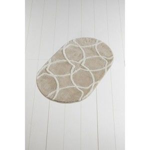 Jasnobeżowy dywanik łazienkowy Confetti Bathmats Bonne Oval Rock, 60x100 cm