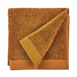 Pomarańczowy ręcznik z bawełny frotte Södahl Clay, 60x40 cm