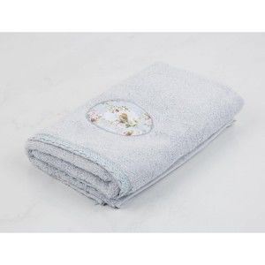 Jasnoniebieski ręcznik bawełniany Madame Coco Flowy, 50x76 cm